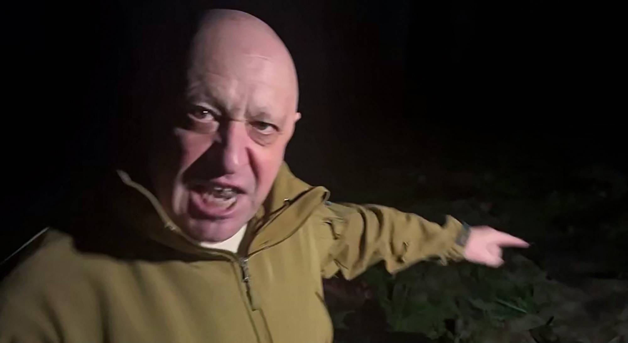 Yevgeny Prigozhin, head of the Wagner mercenary group addresses the Russian army's top brass while standing in front of bodies he presented as fallen Wagner fighters at an undisclosed location in this image taken from video and posted to Prigozhin's Telegram channel. | TELEGRAM / @CONCORDGROUP_OFFICIAL / VIA AFP-JIJI