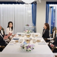 Yoon; his wife, Kim Keon-hee; Kishida; and his wife, Yuko, attend a dinner at the presidential residence in Seoul on Sunday. | SOUTH KOREAN PRESIDENTIAL OFFICE / VIA REUTERS   