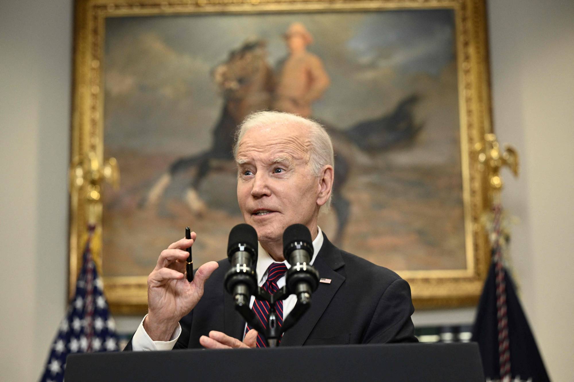 U.S. President Joe Biden speaks at the White House in Washington on Tuesday. | AFP-JIJI