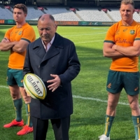 Australia rugby union coach Eddie Jones (center) flanked by Wallabies players Andrew Kellaway (left) and Reece Hodge at a news conference at the Melbourne Cricket Ground, in Melbourne, on May 1  | REUTERS