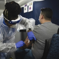A mobile mpox vaccination facility in Manhattan. The World Health Organization announced that mpox no longer constituted a public health emergency. | KHOLOOD EID / THE NEW YORK TIMES