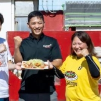 Munenori Yamagawa (center) and other members of Taco Rice Lovers in July 2020 when they launched the free meal ticket project | TACO RICE LOVERS / VIA THE OKINAWA TIMES