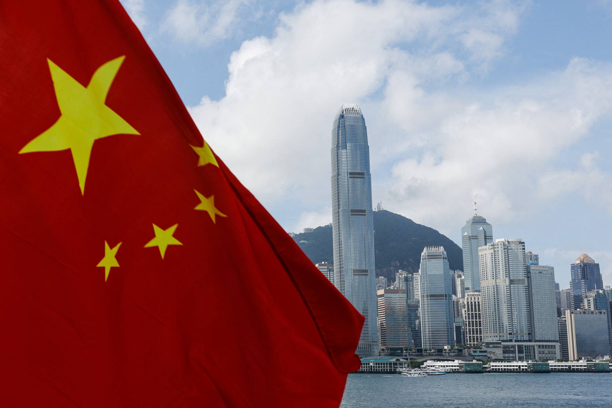 The Chinese national flag is seen in front of Hong Kong's Central financial district on Chinese National Day in the city last October. | REUTERS