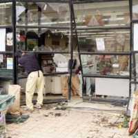 A supermarket where a car driven by an elderly man plowed into the front of the building, injuring five women, is seen in Inazawa, Aichi Prefecture, on Saturday. | KYODO