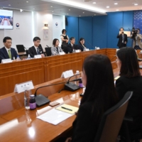 Japanese and South Korean officials from their respective foreign ministries discuss details of Seoul\'s inspection of Japan\'s plan to discharge treated water from the crippled Fukushima No. 1 nuclear power plant, at the Foreign Ministry in Seoul on Friday. | POOL / VIA AFP-JIJI
