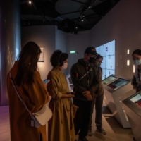Visitors at the TSMC Museum of Innovation in Hsinchu, Taiwan. | LAM YIK FEI / THE NEW YORK TIMES