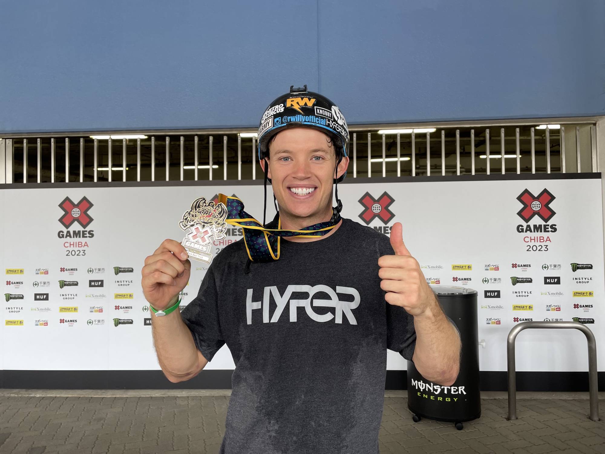 Ryan Willams poses with his gold medal after winning the BMX park best trick competition at X Games Chiba 2023 at Zozo Marines Stadium on Sunday. | Jason Coskrey 