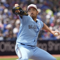 Blue Jays starter Yusei Kikuchi pitches against the Braves at Rogers Centre in Toronto on Sunday. | USA TODAY / VIA REUTERS
