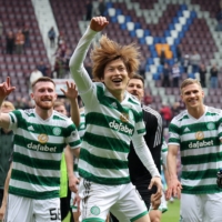 Celtic\'s Kyogo Furuhashi (center) is the second Japanese player to be voted as the top player of the year in the Scottish Premiership.  | REUTERS