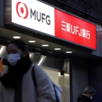 Mitsubishi UFJ Financial Group has forecast a 16% increase in net profit to ¥1.3 trillion ($9.63 billion) for the year ending in March 2024, exceeding a previous record set two years ago. | BLOOMBERG