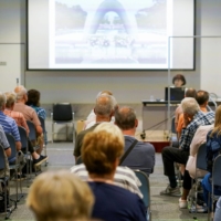 Teruko Yahata, a Hiroshima atomic bombing survivor, speaks about her story to foreign visitors at the Hiroshima Peace Memorial Museum on May 9. | REUTERS