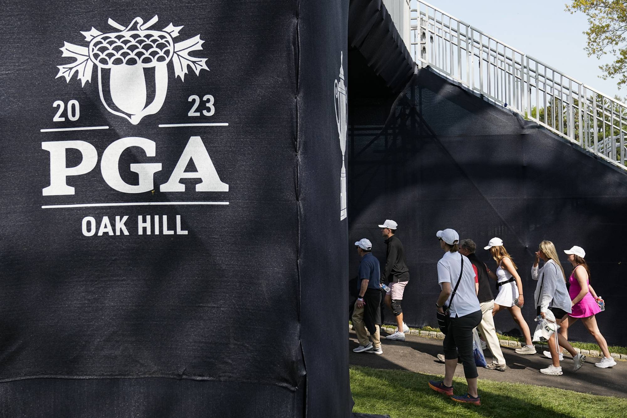 Top exec rebukes LIV but seeks civility at PGA Championship