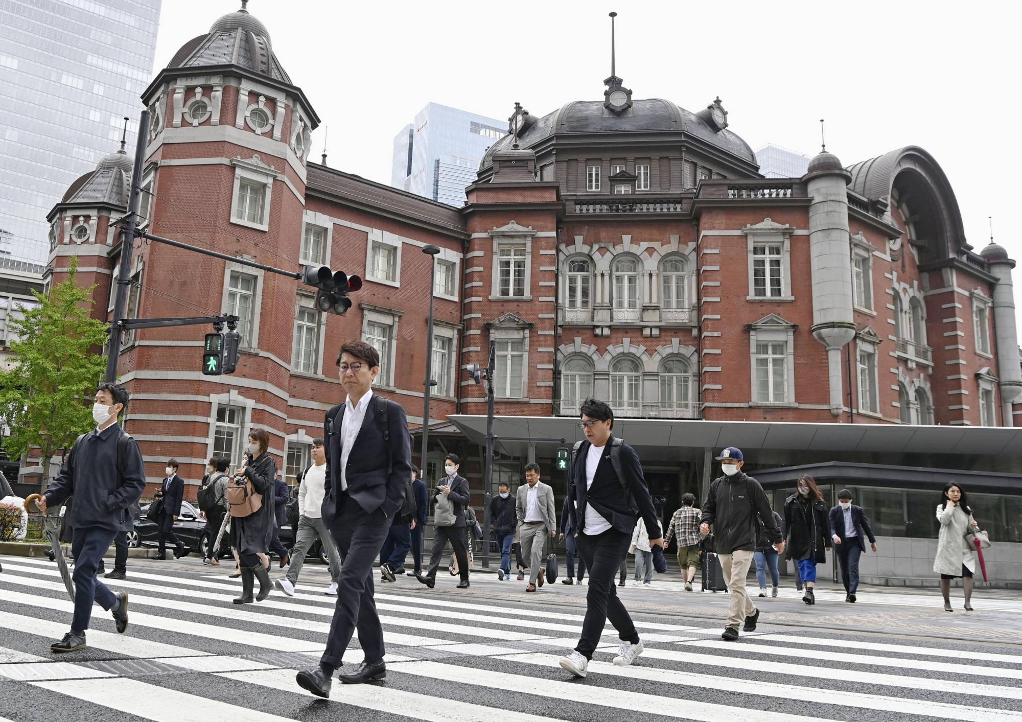 Japan's economy expanded an annualized 1.6% in the January-March period to mark the first increase in three quarters, data showed on Wednesday, as a post-COVID rebound in consumption offset global headwinds. | KYODO