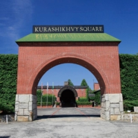 A red arched gate marks the entrance to the Kurashiki Ivy Square complex. | CITY OF KURASHIKI