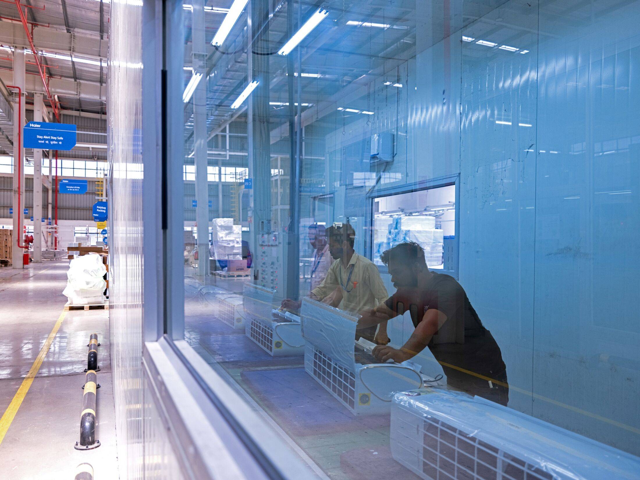 The Haier Appliances India plant in Greater Noida. Demand for air conditioners is surging in the country. | Bloomberg