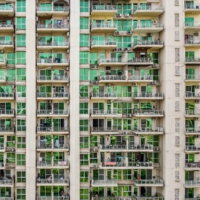 A residential building on the outskirts of New Delhi. For many in Delhi’s working-class neighborhoods, access to an air conditioner is a matter of survival. | BLOOMBERG