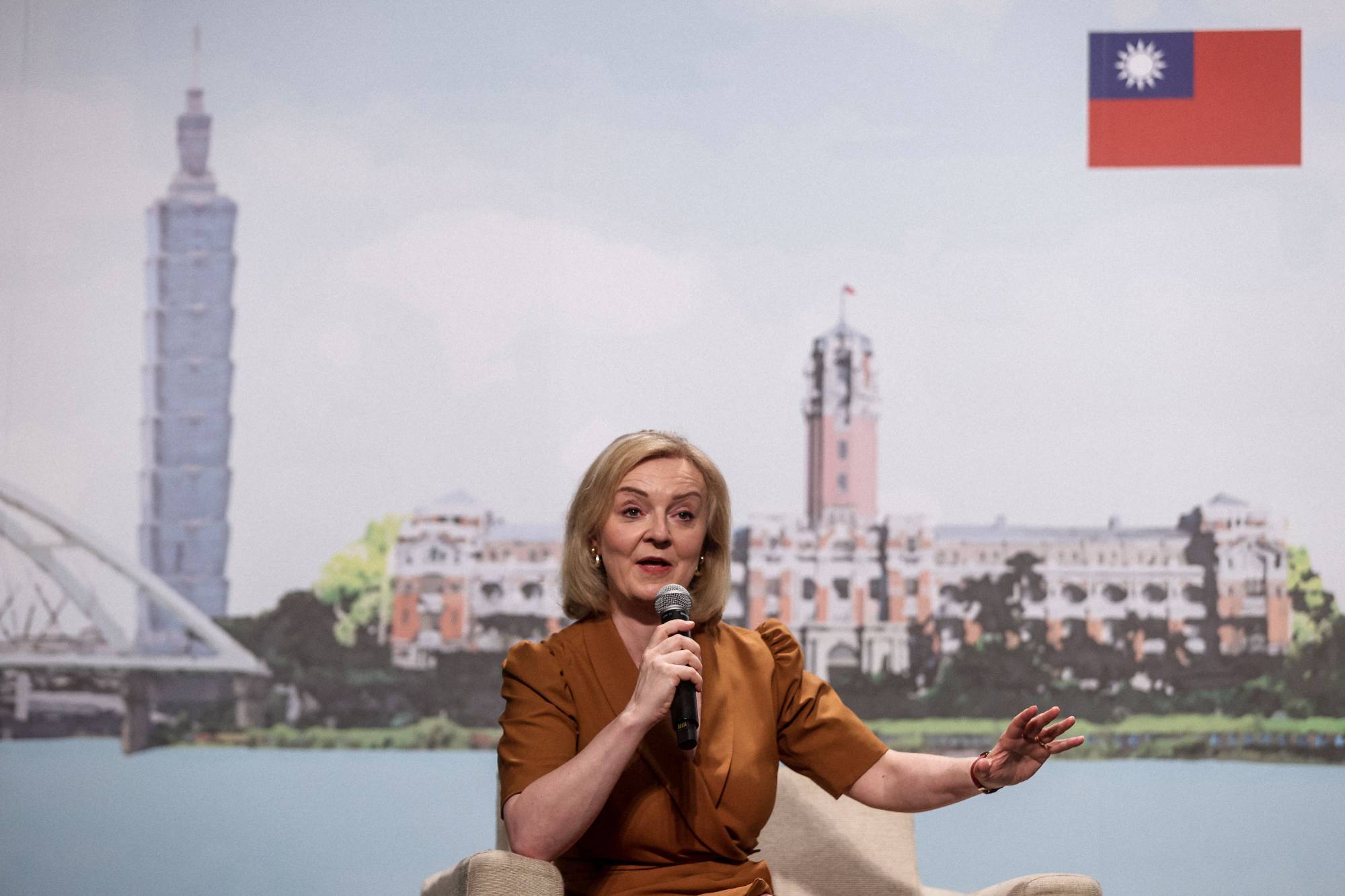 Former British Prime Minister Liz Truss speaks during a news conference in Taipei on Wednesday as part of her five-day visit to Taiwan. | AFP-JIJI