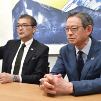 JCI representatives Sergio Shigeo Kato (left) and Takejiro Sueyoshi are interviewed by The Japan Times. | YOSHIAKI MIURA