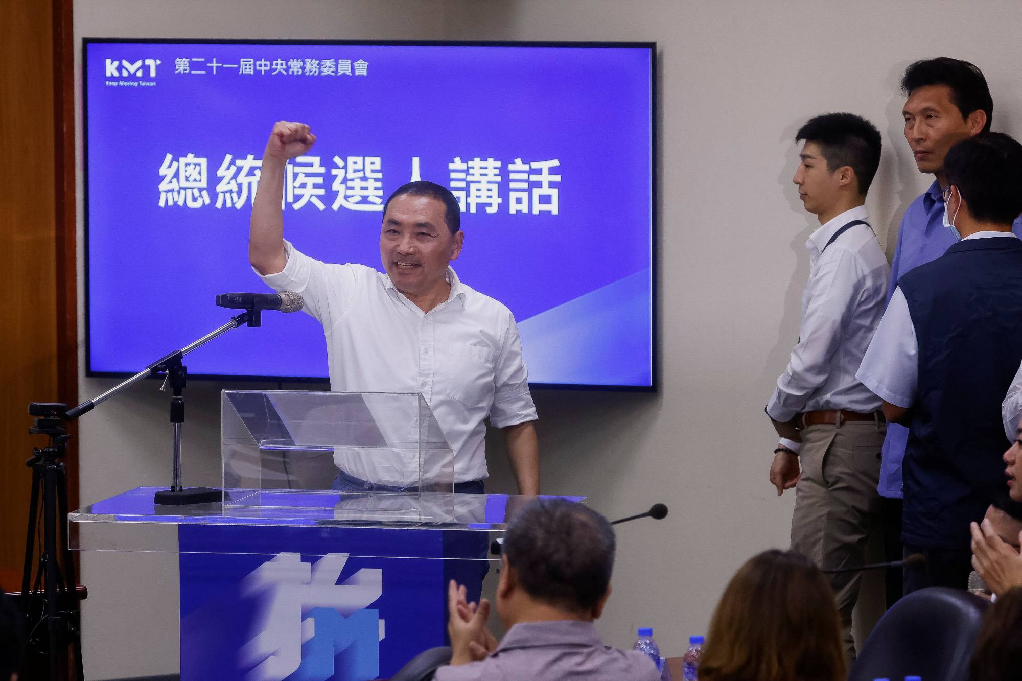 New Taipei City Mayor Hou Yu-ih raises his fist during a speech following his confirmation as the presidential candidate for Taiwan's main opposition Kuomintang, at their headquarters in Taipei on Wednesday.  | REUTERS