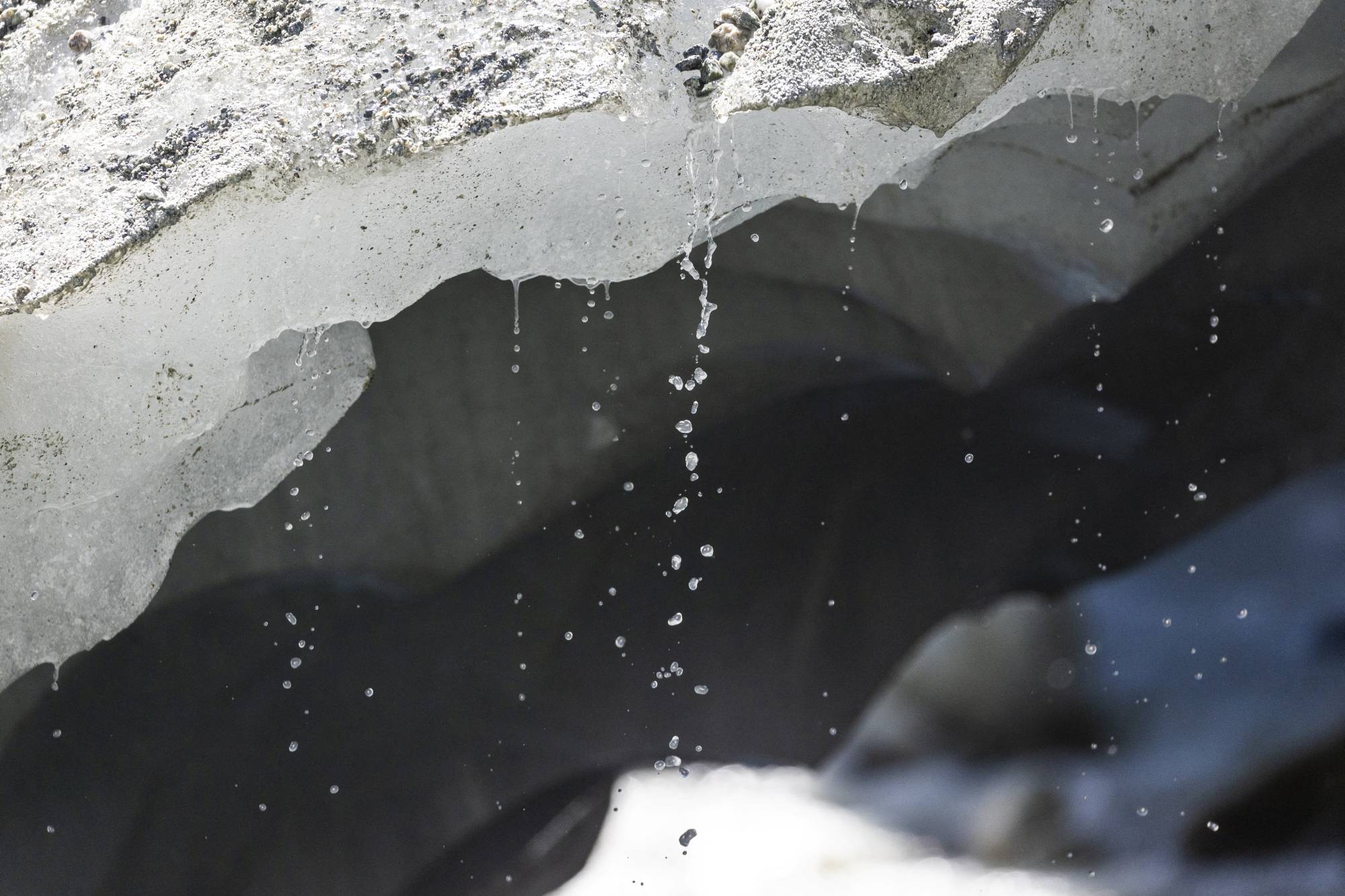 Ice melts at the Mont Mine glacier in Ferpecle near Evolene, Switzerland, in August 2022. | REUTERS Ice melts into water at the Mont Mine glacier in Ferpecl