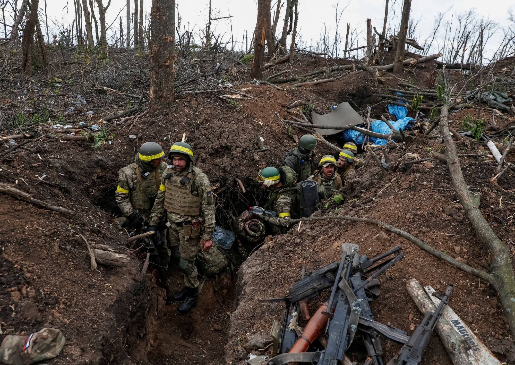 Ukrainian soldiers near the front-line city of Bakhmut, Ukraine, on May 11. | Radio Free Europe / via REUTERS