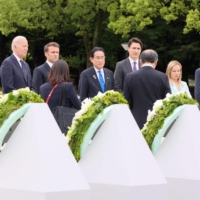 The G7 leaders after laying wreaths during a visit to the Peace Memorial Park in Hiroshima on Friday | MINISTRY OF FOREIGN AFFAIRS OF JAPAN / VIA AFP-JIJI