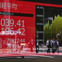 A stock board showing the 225-issue Nikkei average in Tokyo on Wednesday.  | AFP-JIJI