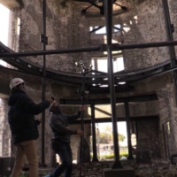 NHK videographers collect inside the Atomic Bomb Dome in February. | COURTESY OF NHK
