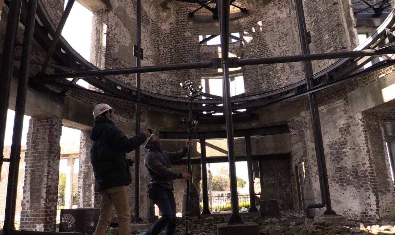 NHK videographers collect inside the Atomic Bomb Dome in February. | COURTESY OF NHK

