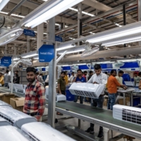 The factory floor at a air conditioner plant of Haier Appliances India in Greater Noida earlier this month. As the G7’s total share of global gross domestic product has dropped to just under 30% this year, low and middle-income countries like India will need to play an increasing role in the bloc’s economic security strategy. | BLOOMBERG