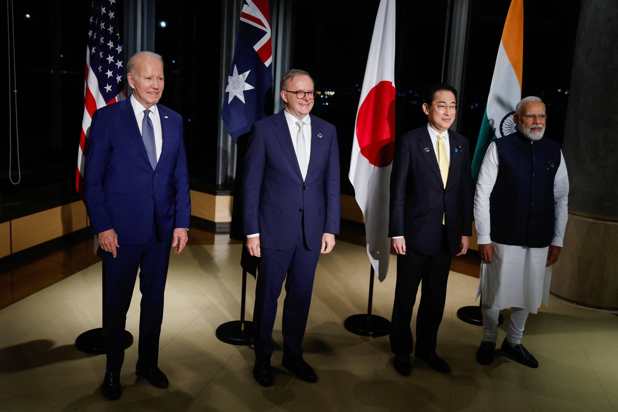 'Quad' leaders — U.S. President Joe Biden, Australian Prime Minister Anthony Albanese,  Prime Minister Fumio Kishida and Indian leader Narendra Modi — pose for a photo ahead of a meeting on the sidelines of the Group of Seven summit, at the Grand Prince Hotel in Hiroshima on Saturday. | POOL / VIA REUTERS