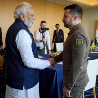 Ukrainian President Volodymyr Zelenskyy shakes hands with Indian Prime Minister Narendra Modi in Hiroshima, during talks on the sidelines of the Group of Seven leaders\' summit in Hiroshima on Saturday. | UKRAINIAN PRESIDENTIAL PRESS SERVICE / VIA AFP-JIJI