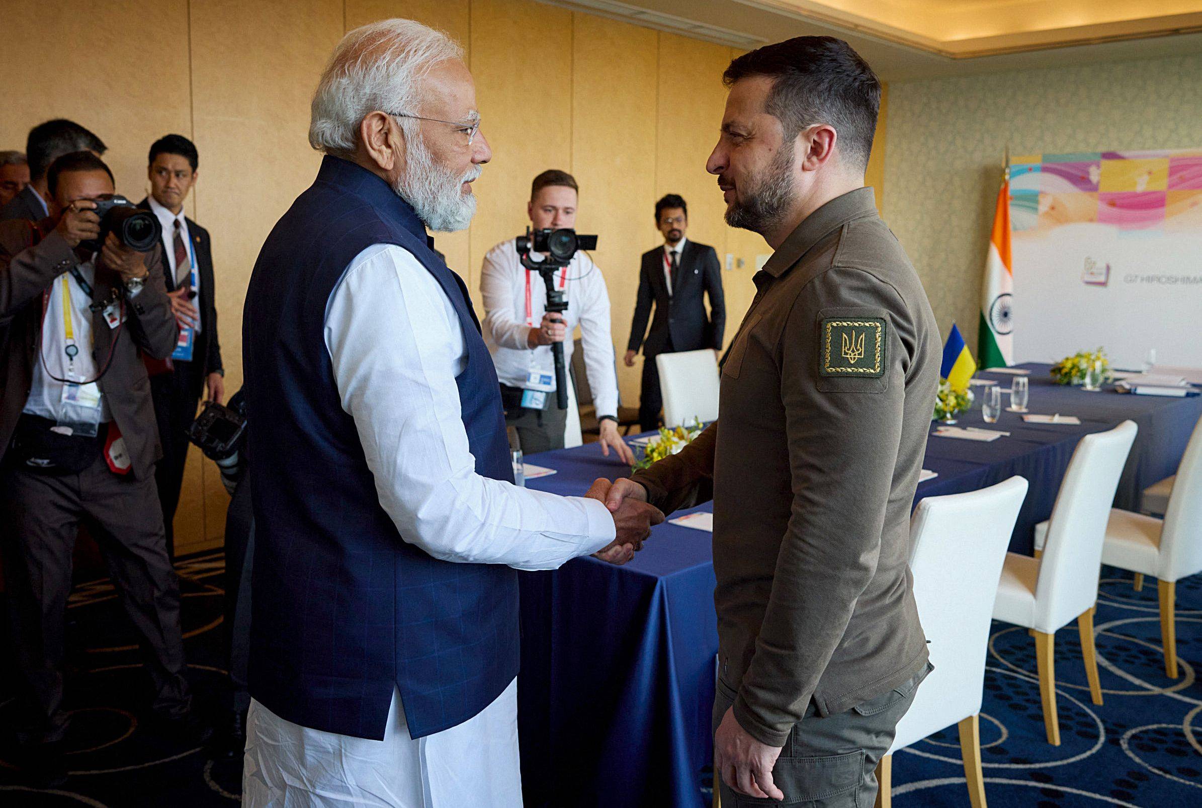Ukrainian President Volodymyr Zelenskyy shakes hands with Indian Prime Minister Narendra Modi in Hiroshima, during talks on the sidelines of the Group of Seven leaders' summit in Hiroshima on Saturday. | UKRAINIAN PRESIDENTIAL PRESS SERVICE / VIA AFP-JIJI
