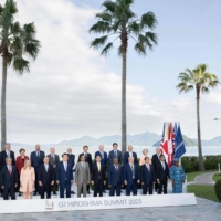 The G7 leaders have said boosting deliveries of liquefied natural gas is a temporary response to energy shortages caused by the Russia-Ukraine war, but environment groups warn that the continued embrace of fossil fuels will hamper the fight against global warming. | POOL / VIA AFP-JIJI
