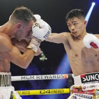 Junto Nakatani (right) is undefeated with 25 wins, including 19 via knockout, after beating Andrew Moloney in Las Vegas on Saturday. | AP / VIA KYODO