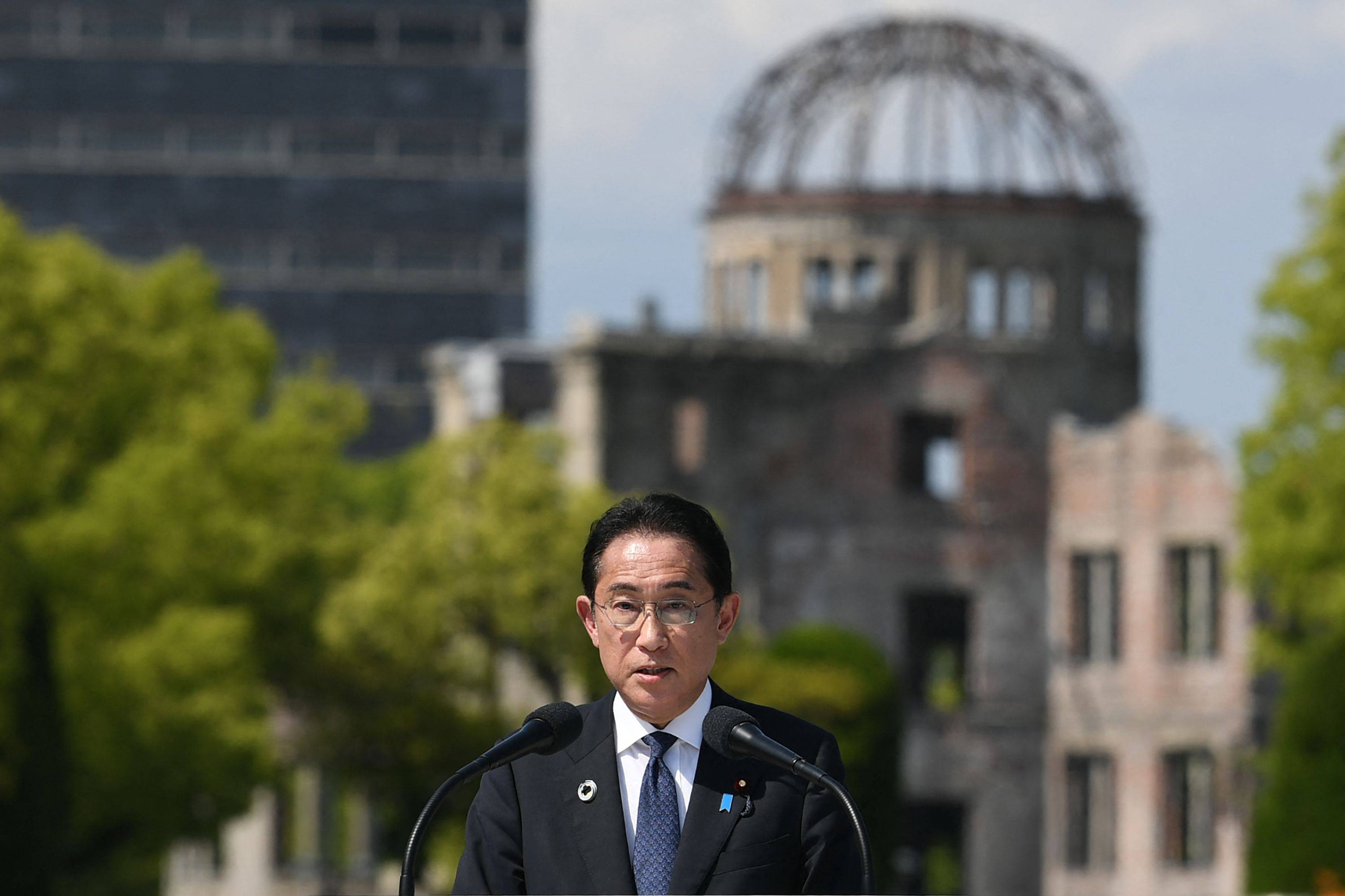 Prime Minister Fumio Kishida speaks in a news conference at the end of the Group of Seven leaders' summit on Sunday at the Hiroshima Peace Memorial Park. | FOREIGN MINISTRY / VIA AFP-JIJI