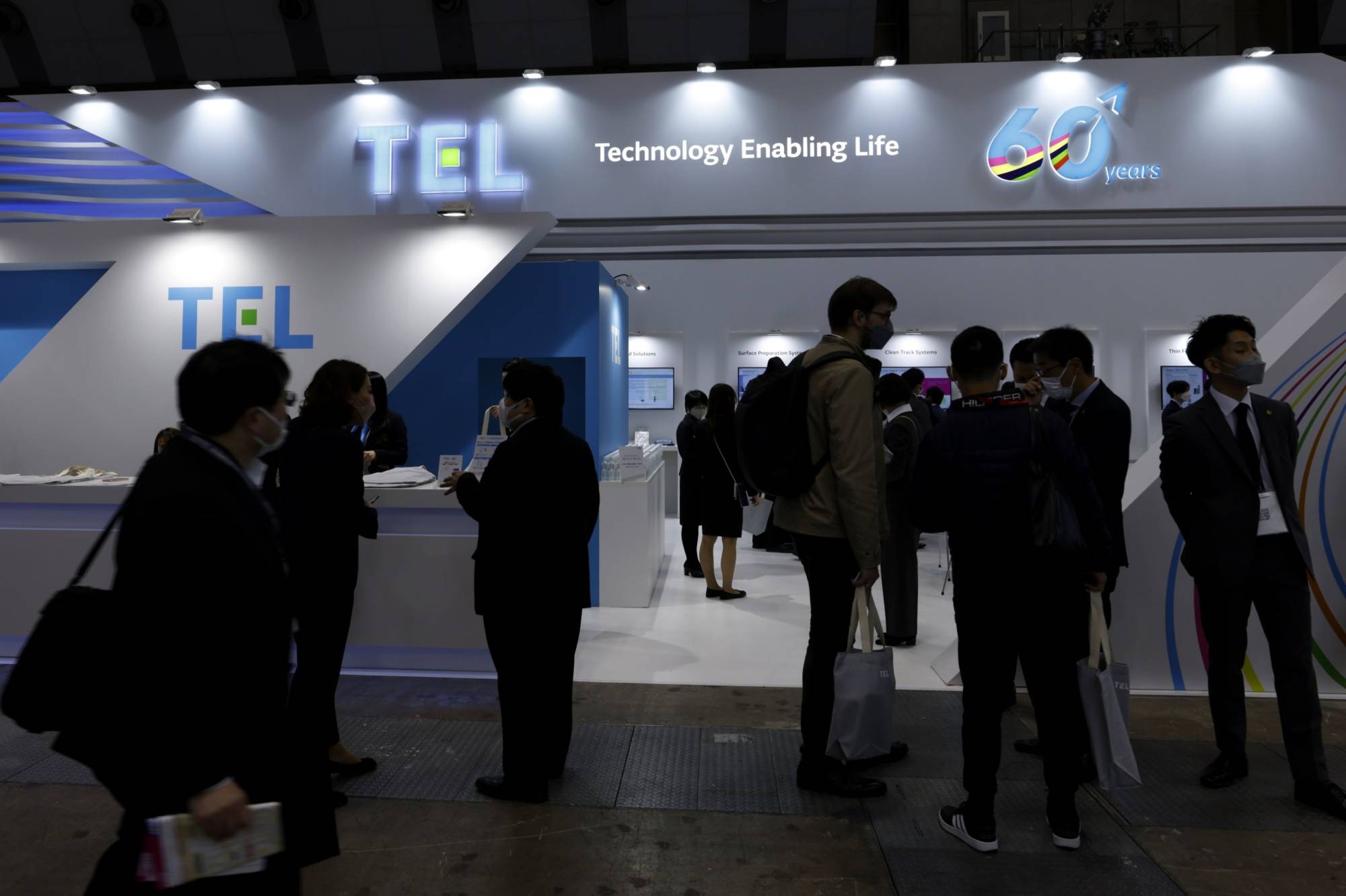 The Tokyo Electron booth at the Semicon Japan exhibition in Tokyo in December. Tokyo Electron is one of some 10 Japanese manufacturers that will be affected by tighter regulations on the export of semiconductor manufacturing equipment to China. | BLOOMBERG