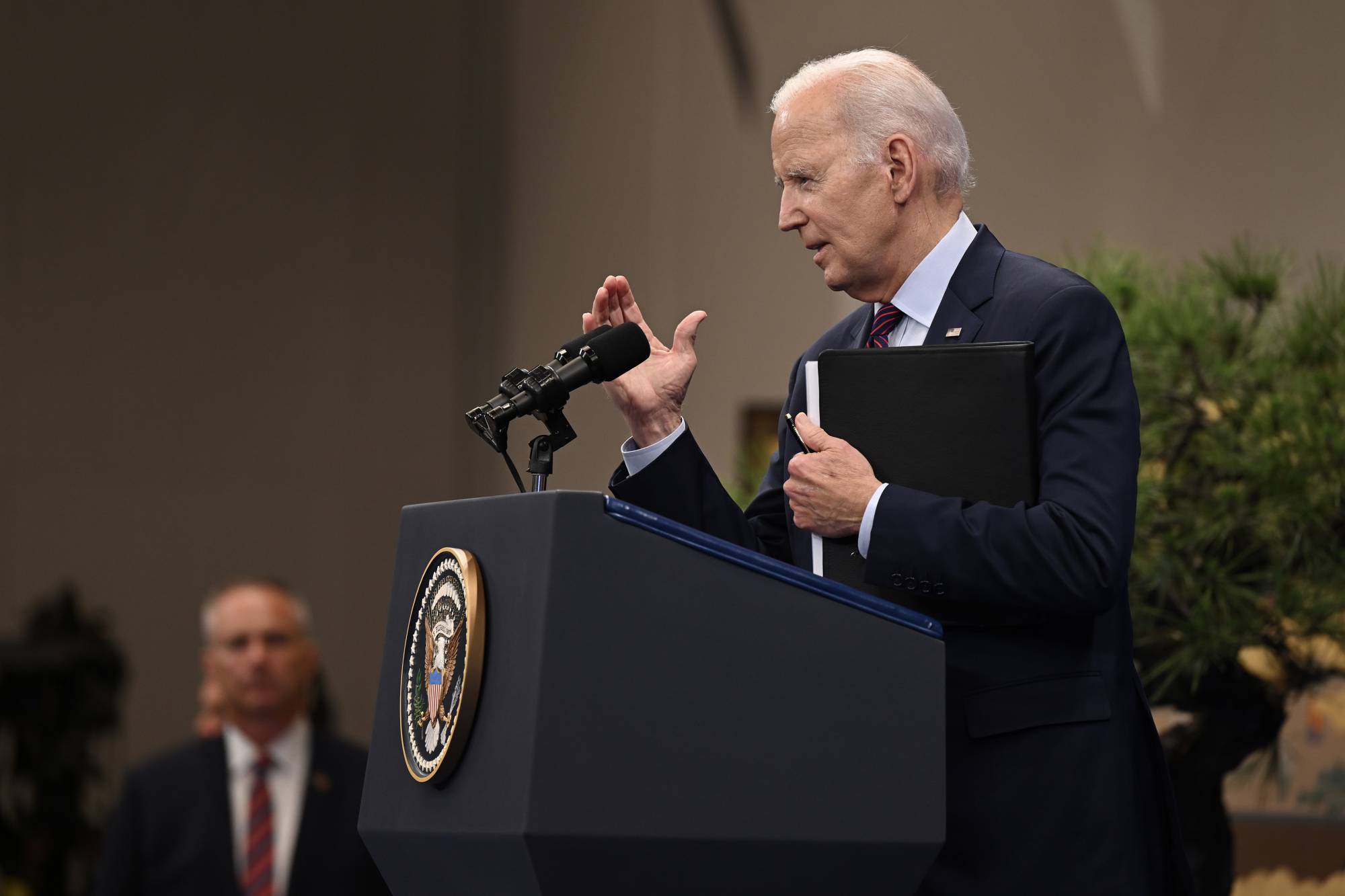 U.S. President Joe Biden speaks during a news conference on the last day of the Group of Seven summit in Hiroshima on Sunday. | KENNY HOLSTON / THE NEW YORK TIMES