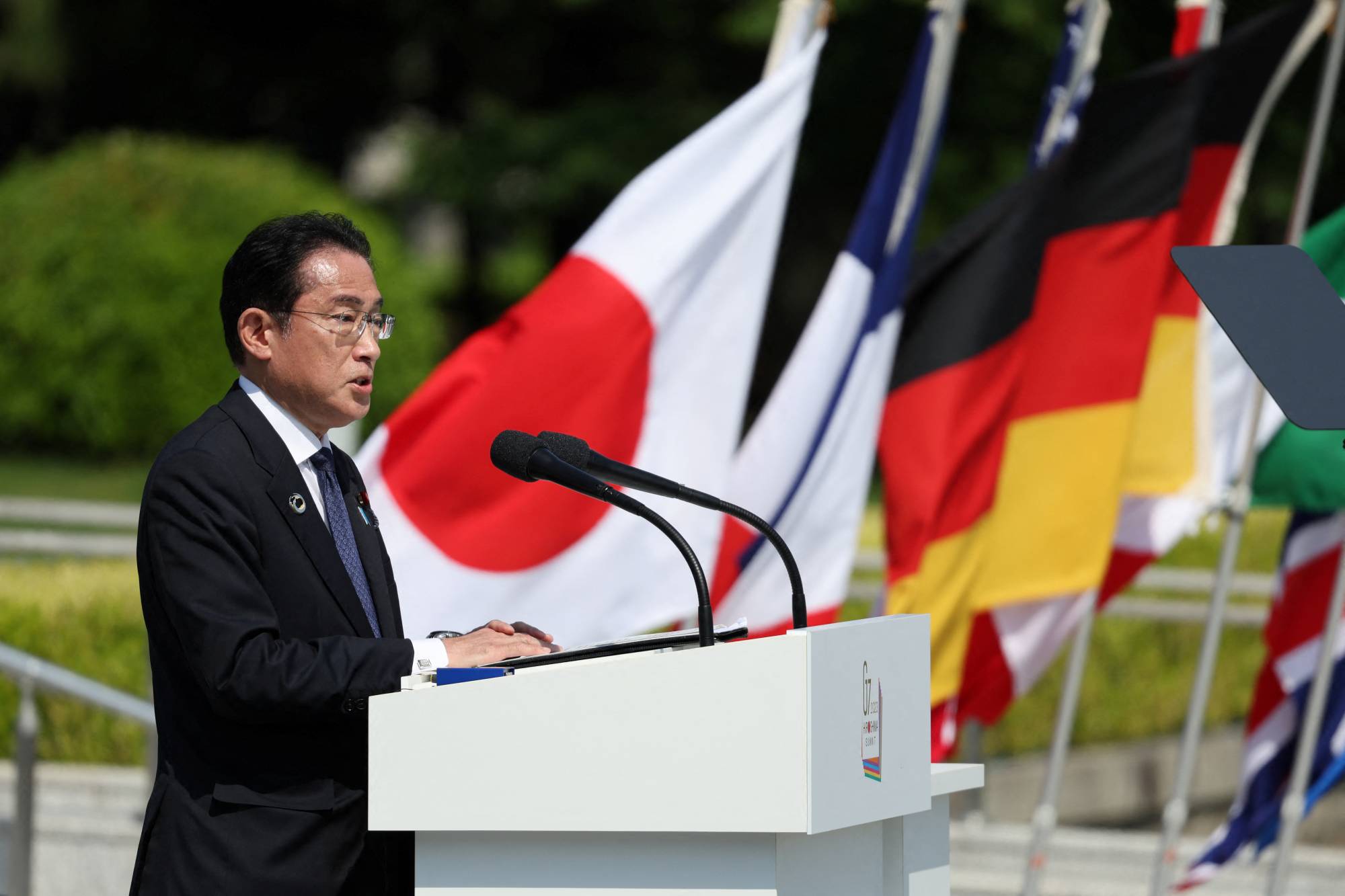 Prime Minister Fumio Kishida speaks at the Peace Memorial Park in Hiroshima on Sunday. | MINISTRY OF FOREIGN AFFAIRS OF JAPAN / VIA REUTERS