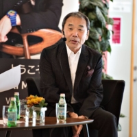 Haruki Murakami, seen in Denmark in October 2016, is known for his intricate tales of the absurdity and loneliness of modern life. | SCANPIX DENMARK / HENNING BAGGER/ VIA REUTERS