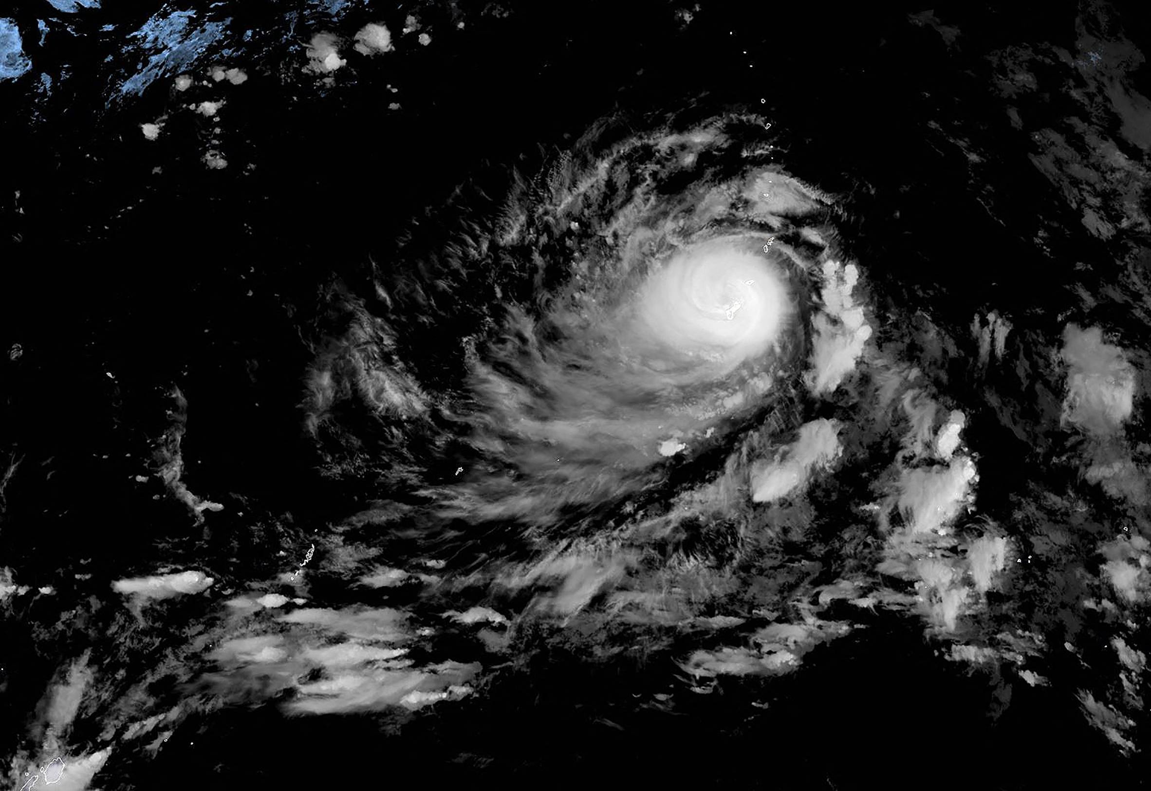 This satellite image obtained from the The National Oceanic and Atmospheric Administration shows Typhoon Mawar over Guam on Wednesday. | NOAA / RAMMB / VIA AFP-JIJI