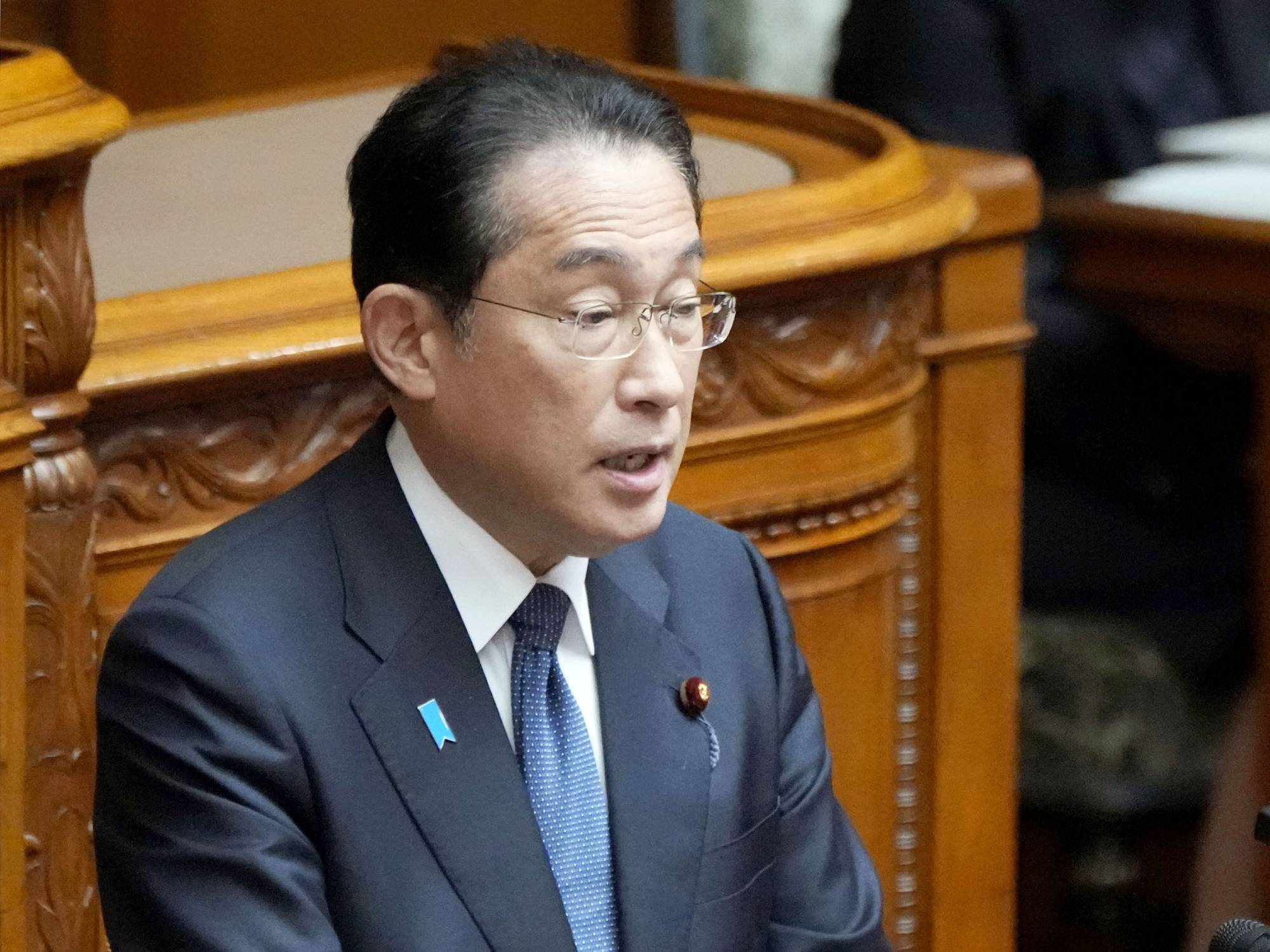 Prime Minister Fumio Kishida speaks at a plenary session of the House of Councilors on Wednesday. | KYODO