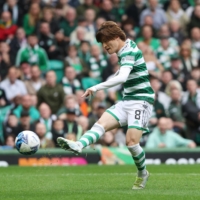 Kyogo Furuhashi scores Celtic\'s first goal against St. Mirren during their match at Celtic Park in Glasgow, Scotland, on May 20. | REUTERS