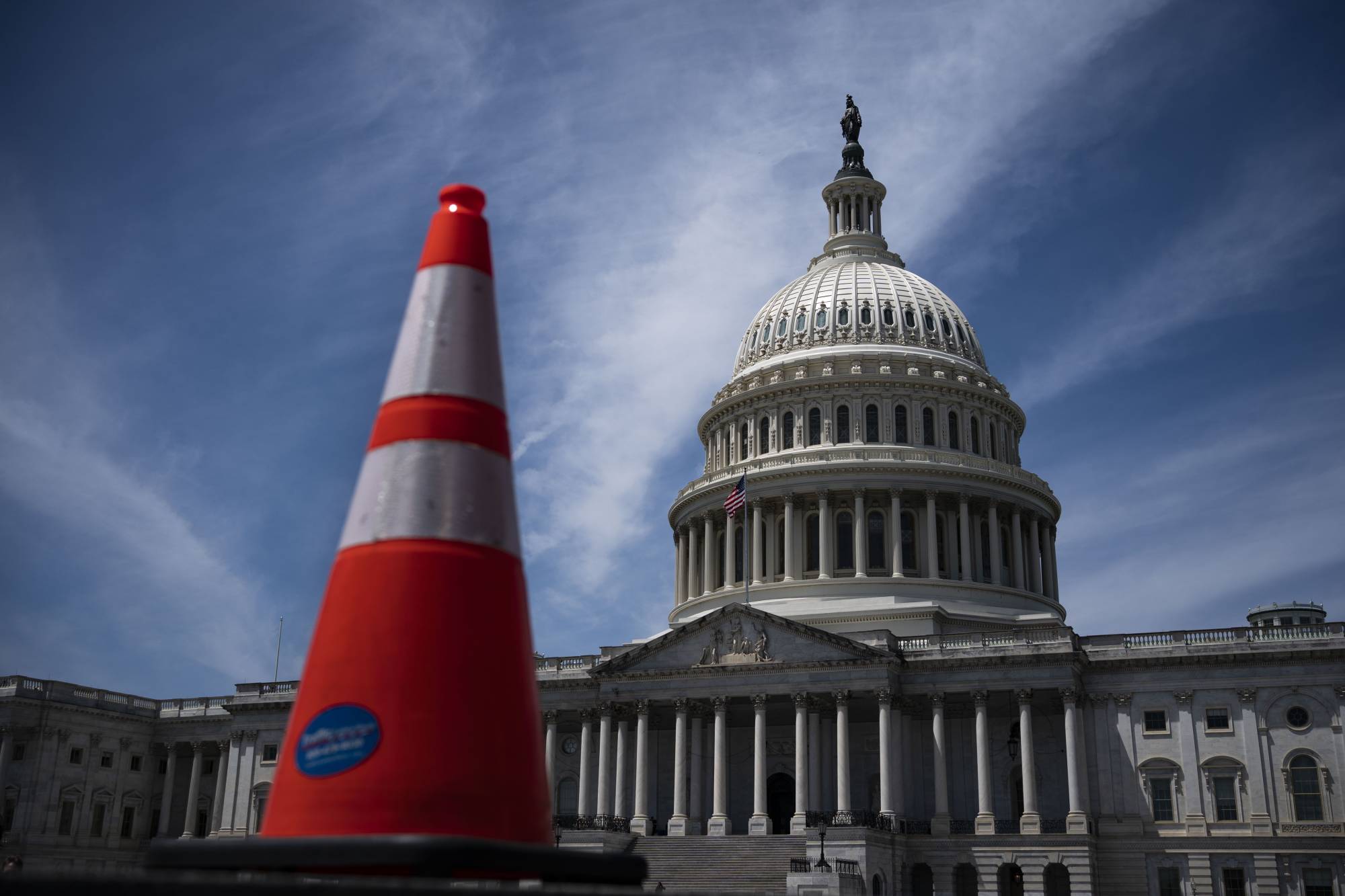 The tentative agreement on the debt ceiling would avert an economically destabilizing default, so long as they succeed in passing it through the narrowly divided Congress before the Treasury Department runs short of money to cover all its obligations, which it warned Friday will occur if the debt ceiling is not raised by June 5. | HAIYUN JIANG / THE NEW YORK TIMES