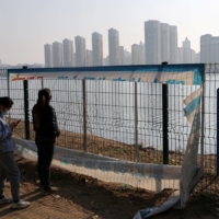 A riverside area of Beijing in April. Chinese health authorities have reported a rise in COVID-19 cases since April, especially from newer subvariants that are spreading across the world. | REUTERS