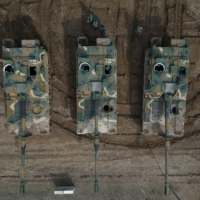 Polish soldiers stand near K9 howitzers, delivered in the first batch of arms from South Korea under contracts signed in recent months, during a military drill at a military range in Wierzbiny near Orzysz, Poland, on Mar. 30. | REUTERS