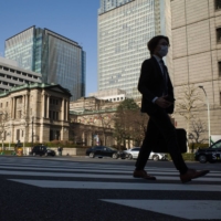 The Bank of Japan (BOJ) headquarters in Tokyo. Former BOJ board member Makoto Sakurai said BOJ-watchers who expect a tweak in the yield control in July may be underestimating how much the U.S. banking crisis has impacted the central bank’s thinking. | BLOOMBERG