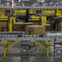 An Amazon Fulfillment center on Staten Island in New York in 2019. At Amazon warehouse workers have shown support for corporate colleagues, noting that they have nothing to gain if office workers lose flexibility the pandemic proved was possible. | HIROKO MASUIKE / THE NEW YORK TIMES
