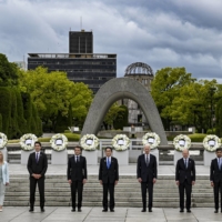 Group of Seven leaders during a wreath-laying ceremony in Hiroshima on May 19. | KENNY HOLSTON / THE NEW YORK TIMES