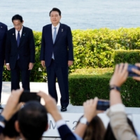 U.S. President Joe Biden, Prime Minister Fumio Kishida and South Korean President Yoon Suk-yeol attend the Group of Seven summit, at the Grand Prince Hotel in the city of Hiroshima last month. | REUTERS


